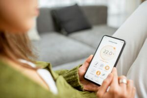 Controlling heating with a smart phone at home