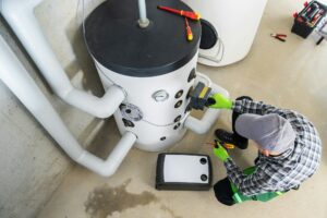 Heating System Technician Performing Regular Maintenance